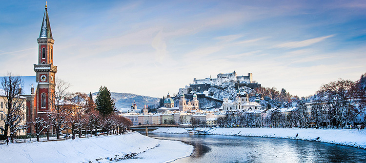 Snowy river and Festung Hohensalzburg, Salzburg, Austria