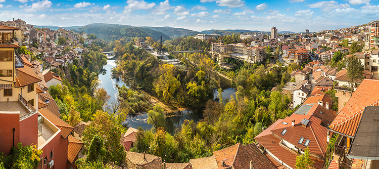 The quaint and colorful village of Veliko Turnovo with the river running through.